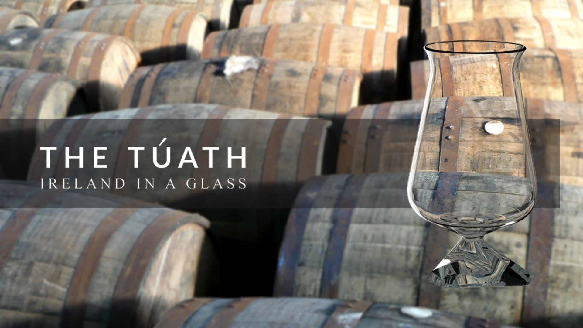the tuath glass with barrels background